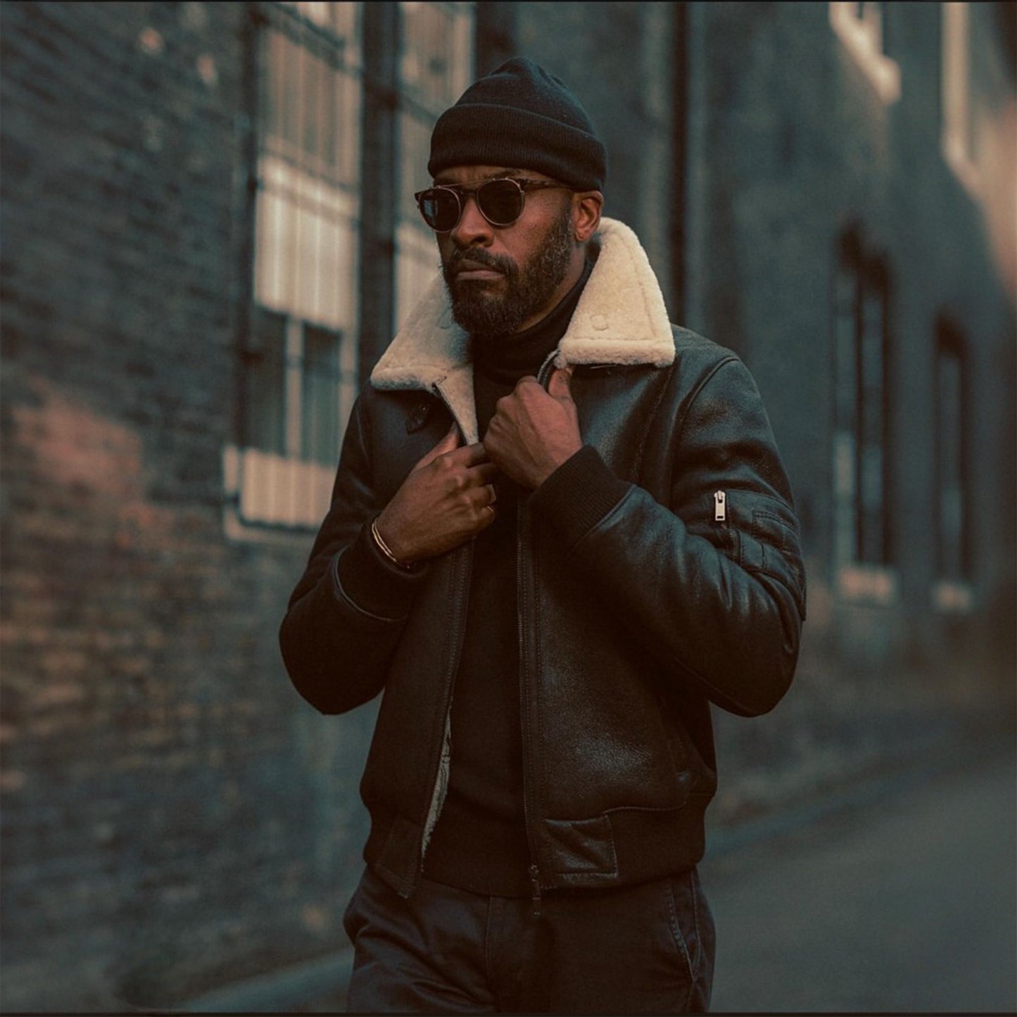 Mens Vintage Aviator Black Sheepskin Shearling Bomber Leather Jacket-Men’s shearling leather jacket – vintage black or white aviator, bomber, or moto style with genuine sheepskin lining for winter.