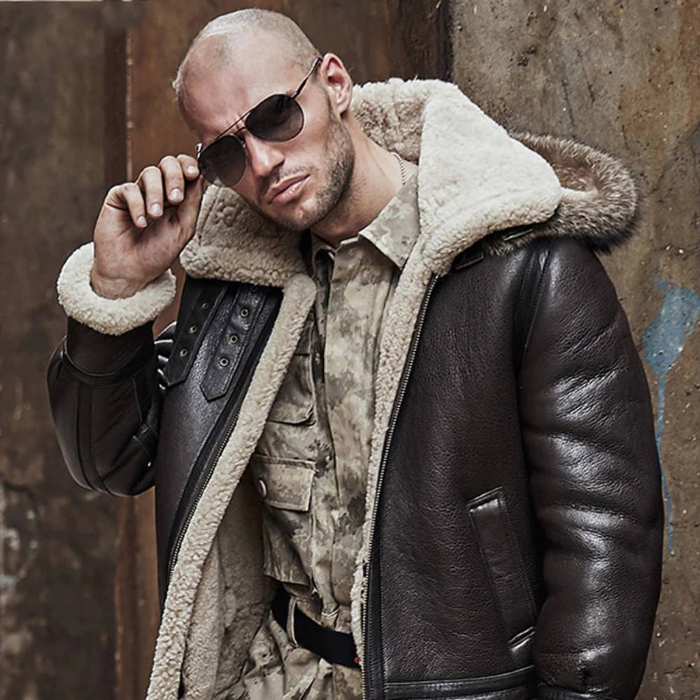 Mens Vintage Aviator Flight Sheepskin Brown Genuine Leather Shearling Jacket​-Hooded brown leather shearling jacket – vintage 70s bomber style with sheepskin lining, shearling collar, and retro design.